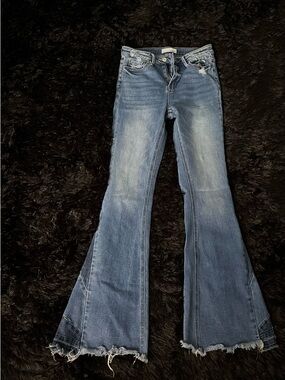 Women’s High-Rise Faded Blue Flare Jeans